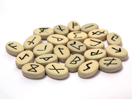 Fortune telling - nordic runes with symbols on stones