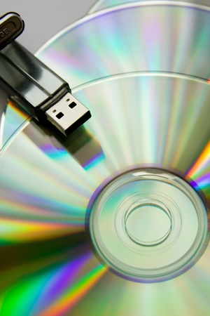 Bright  colourful cd disks with USB flashの写真素材