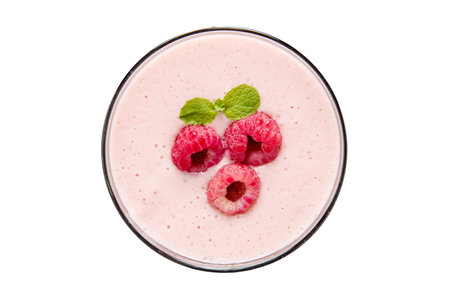Raspberry smoothie in glass isolated on white background. Top view.の写真素材