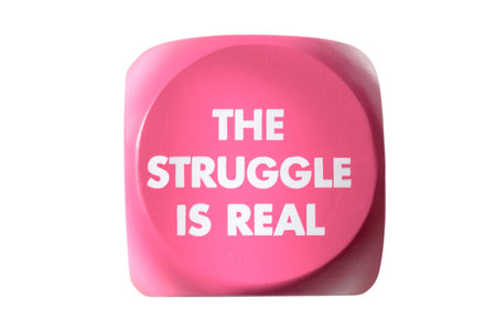 The Strategic Is Real words written on pink button isolated on white backgroundの写真素材