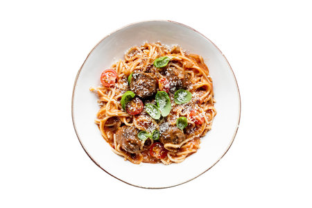 Spaghetti with meatballs and tomato sauce isolated on white background.の写真素材