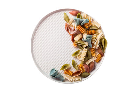 Different types of pasta in a plate on a white background, isolatedの写真素材