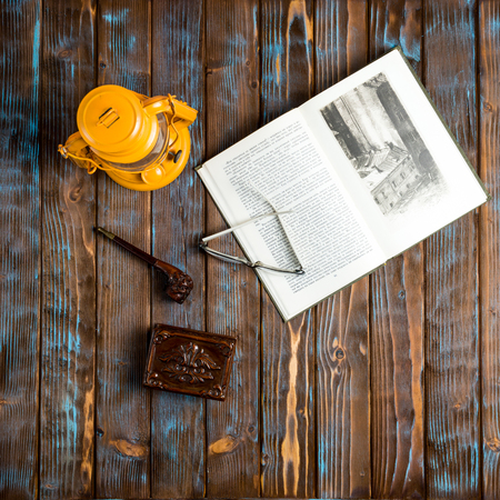 Old book and electric lamp in retro styleの写真素材