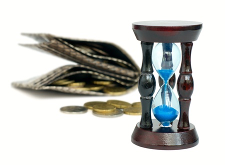 Time is money - sandglass, purse and coins