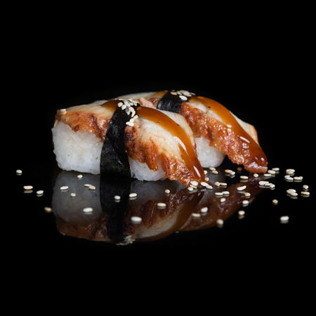 Eel sushi on black backgroundの写真素材