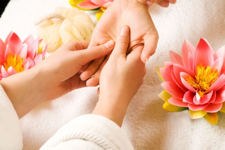 Woman getting a hand massage (close up on hands) Woman getting a hand massage (close up on hands)