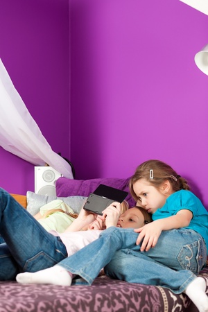Children playing video gamesの写真素材