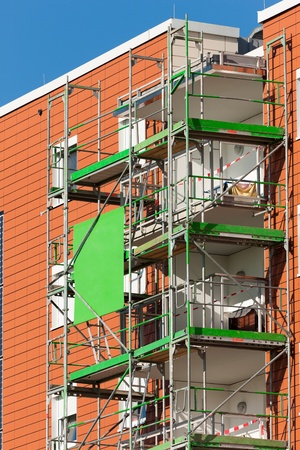 Scaffold on house with flat roofの写真素材