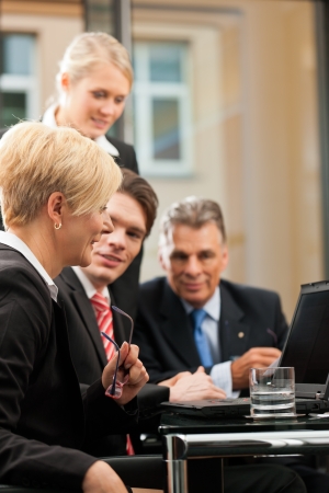 Business - team meeting in an officeの写真素材