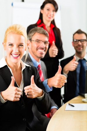 Business - businesspeople have team meeting or workshop in an office, it is a very good team Business - businesspeople have team meeting or workshop in an office, it is a very good team