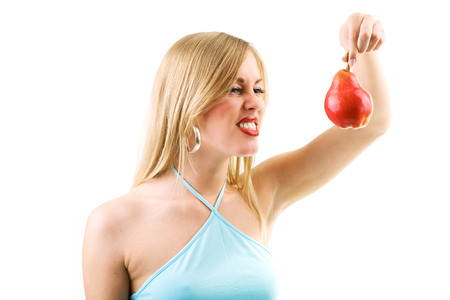 Food, fruit and healthy nutrition - Blond woman does not like the pairの写真素材
