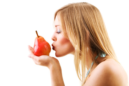 Food, fruit and healthy nutrition - Sweet woman kissing fruitの写真素材