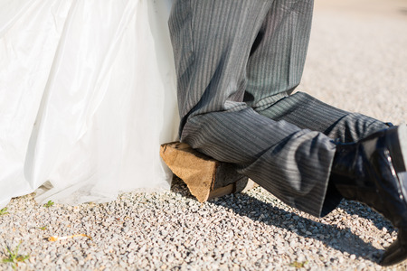 Groom begging bride for mercy after bridal kidnappingの写真素材
