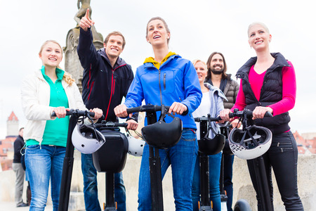 Tourist group having guided Segway city tour in Germanyの写真素材