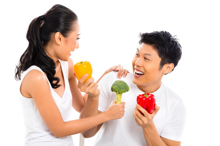 Asian couple eating and living healthyの写真素材