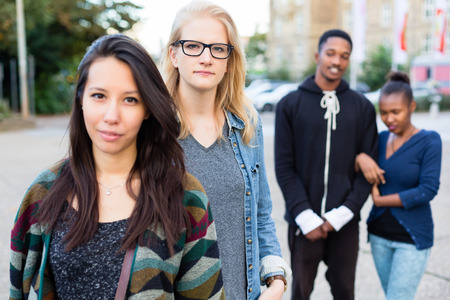 Diversity friends in city, group of African, Asian and Caucasian people