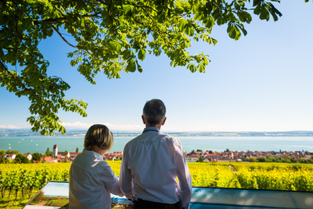 Senior couple enjoying view on Bodensee in summerの写真素材