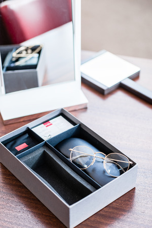 New glasses in present box at optician storeの写真素材