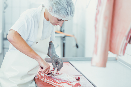 Pork Meat cutting in butcheryの写真素材