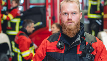 Portrait of a young and determined firefighterの写真素材