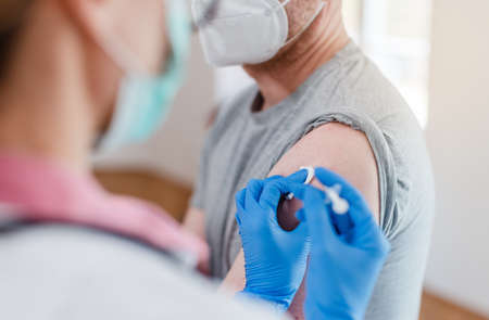 Man getting shot of  vaccine