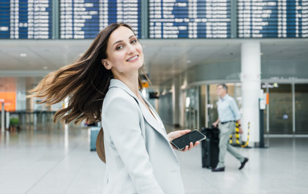 Successful businesswoman at the airport on travelの写真素材