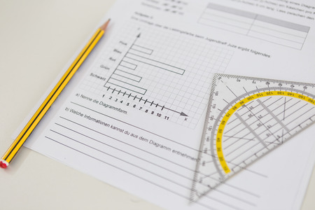 Mathematics class work - paper, pen, geodesic triangle