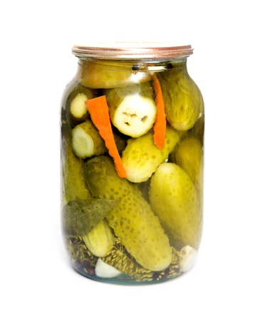 cucumbers in glass jarの写真素材