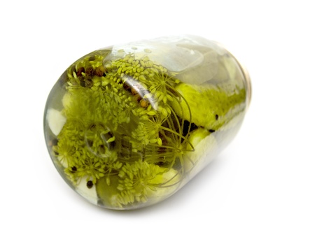 cucumbers in glass jarの写真素材