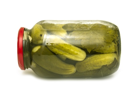 pickles in a glass jar is isolated on a white backgroundの写真素材