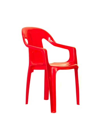 Red plastic chair on a white backgroundの写真素材
