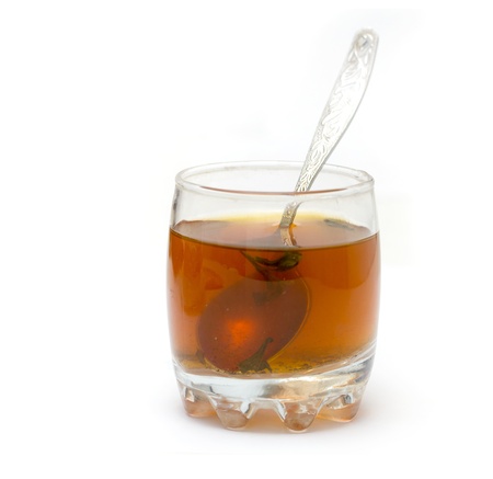 cup of tea with a spoon on a white backgroundの写真素材
