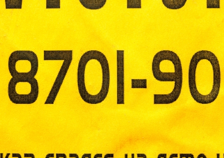 yellow paper background with numbersの写真素材