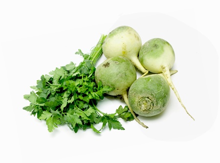 green radish, parsley on white background