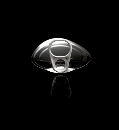 tin can ring pull isolated on a black background