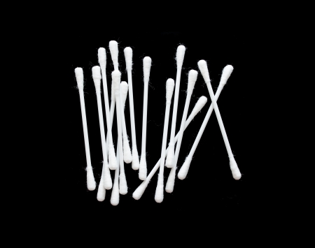 Cotton sticks isolated on black background
