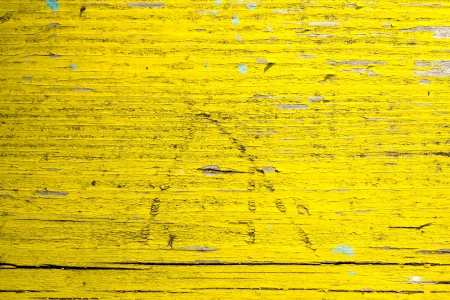 old wood texture traces of yellow paintの写真素材