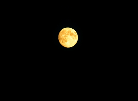 full moon on black skyの写真素材