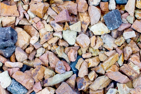 Rail road track ballast stone gravel close-up as background
