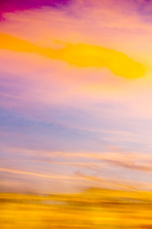 purple and orange clouds during sunsetの写真素材