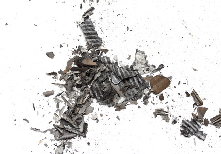 the ashes of the paper on a white background