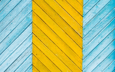 Close up of a weathered stained wooden fenceの写真素材