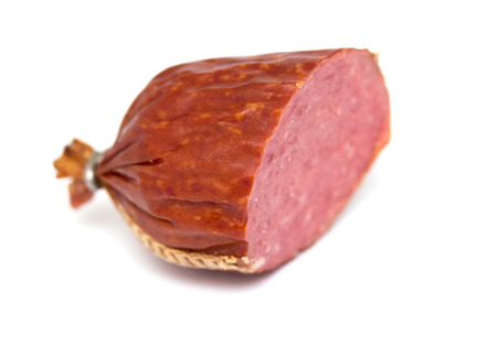 smoked sausage on a white backgroundの写真素材