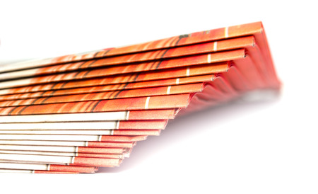 Newspapers folded and stacked concept for global communications