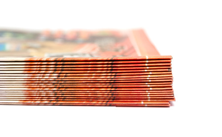 Newspapers folded and stacked concept for global communications