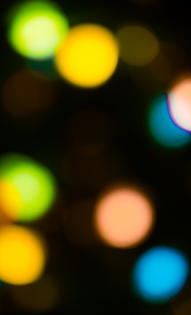 holiday bokeh blurred on a dark background