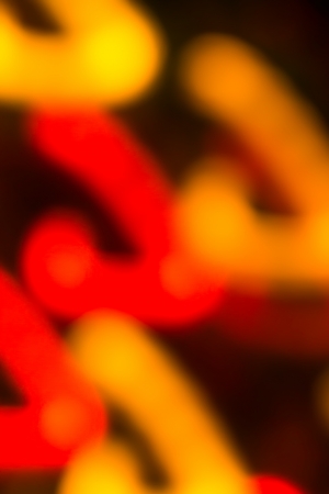 holiday bokeh blurred on a dark backgroundの写真素材