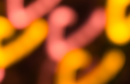 holiday bokeh blurred on a dark backgroundの写真素材