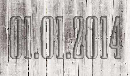 01.01.2014 transparent embossed on wooden backgroundの写真素材
