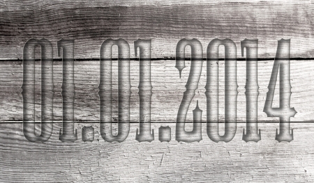 01.01.2014 transparent embossed on wooden background